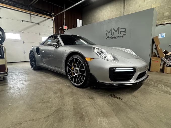 Silver Porsche 911 Turbo inside MMr Autosport